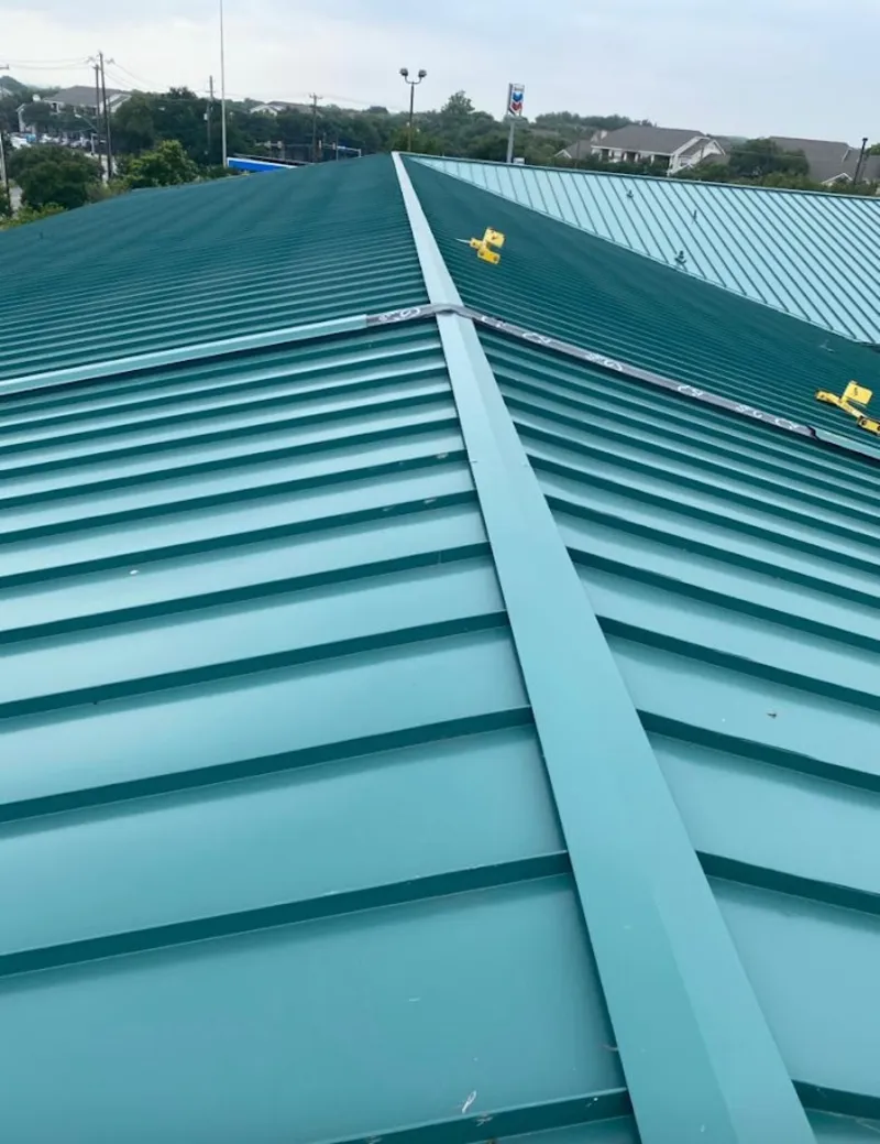 Green commercial metal roof ridge and valley for Metal Roof Repair in Lake Bluff