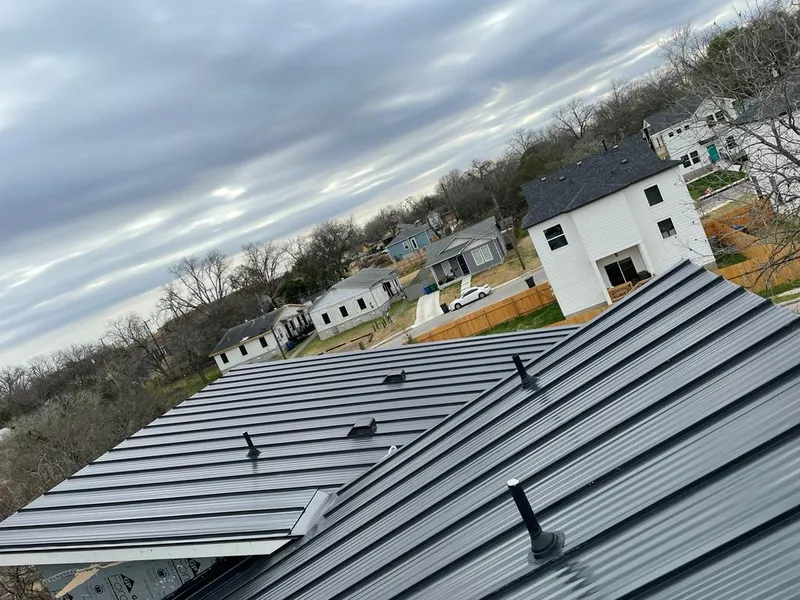 Standing seam metal roof panels with vents for Skylight Repair in Lake Bluff